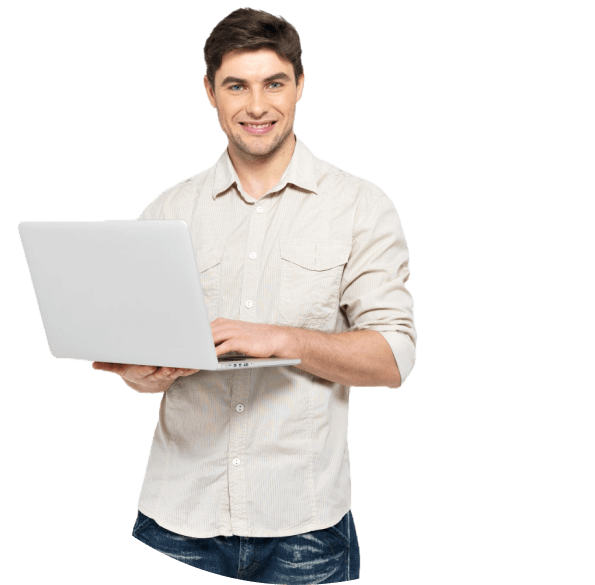 a boy standing with a laptop